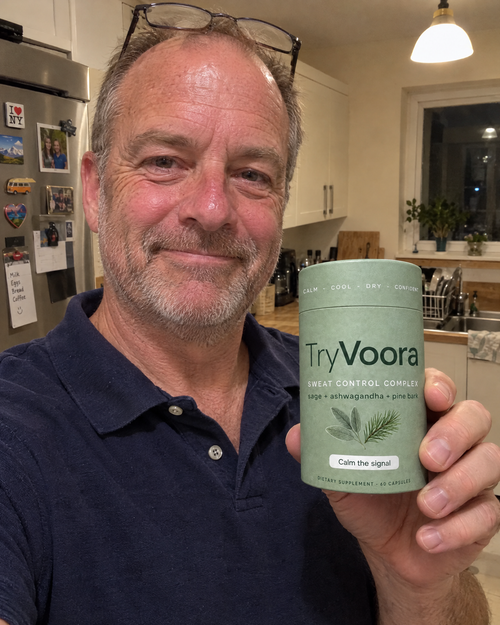 Customer holding Voora in his kitchen