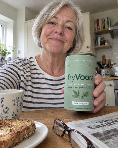 Customer holding Voora at breakfast